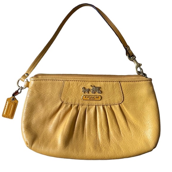 Coach Handbags - COACH Wristlet in Mustard Yellow